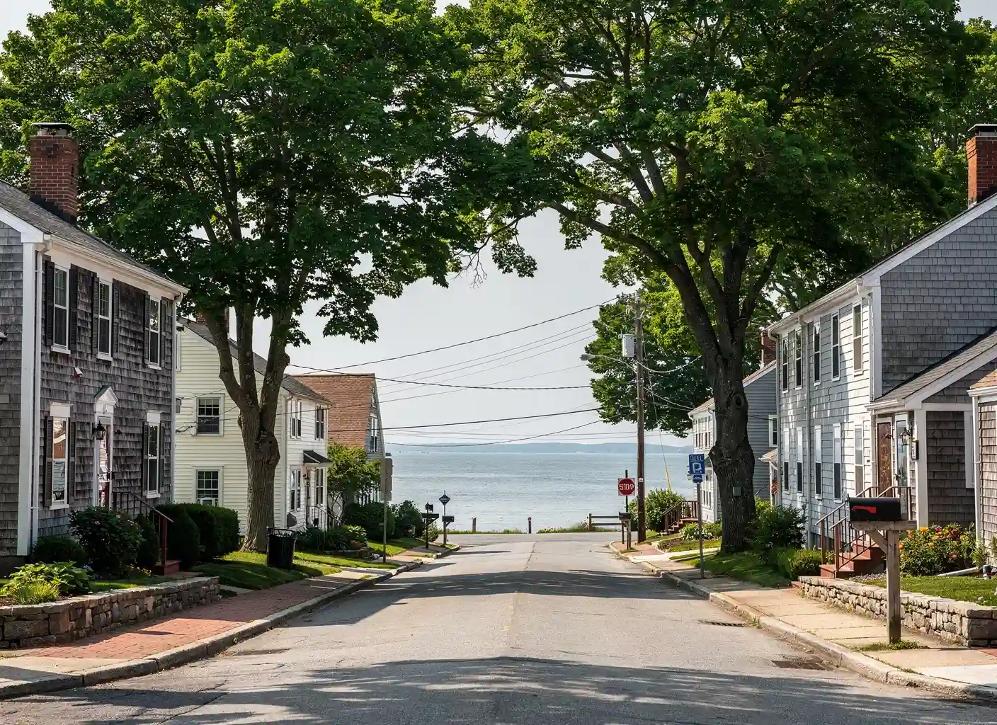 Milford shoreline neighborhood with mature trees near Long Island Sound