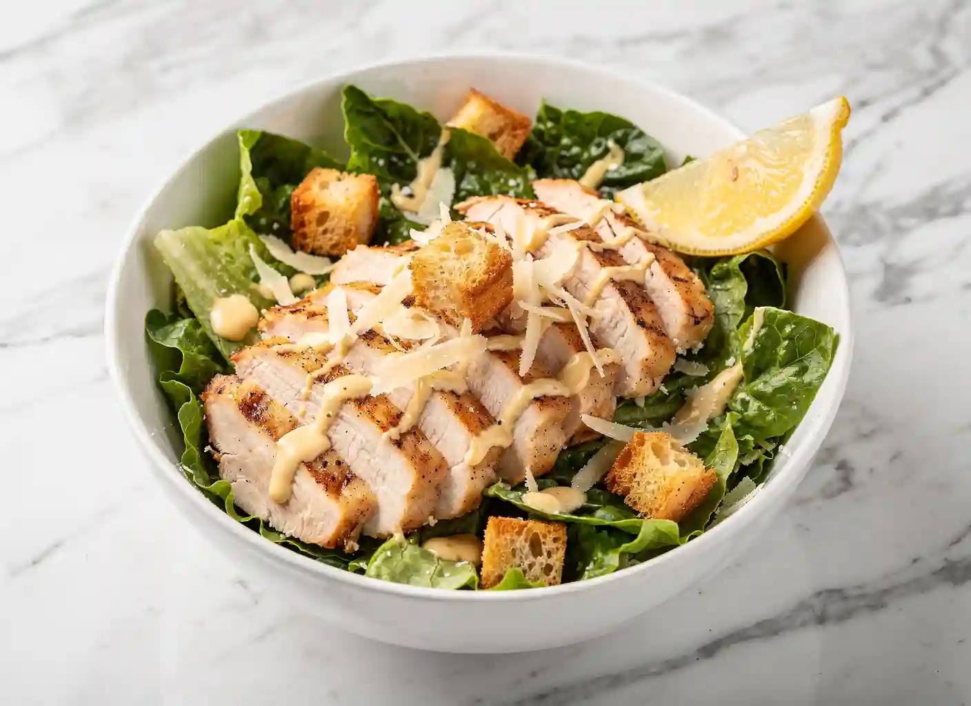 Chicken caesar bowl with parmesan and croutons
